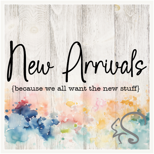 New Arrivals collection graphic on a weathered wood background with watercolor splashes